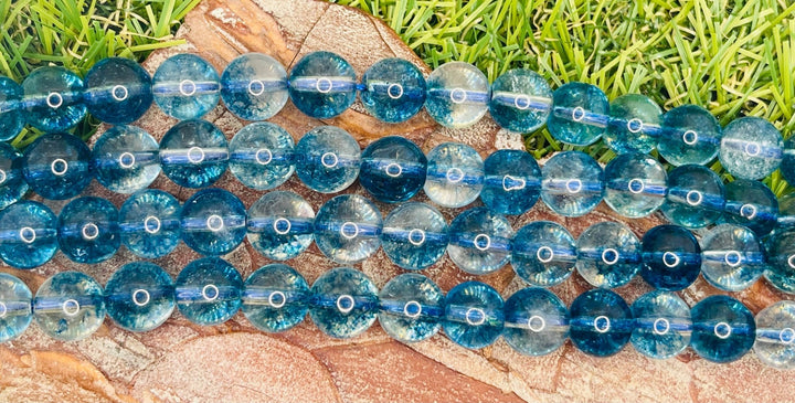 Perles naturelles en Cristal de Roche craquelé bleu en 6 mm - Les bijoux de Théa