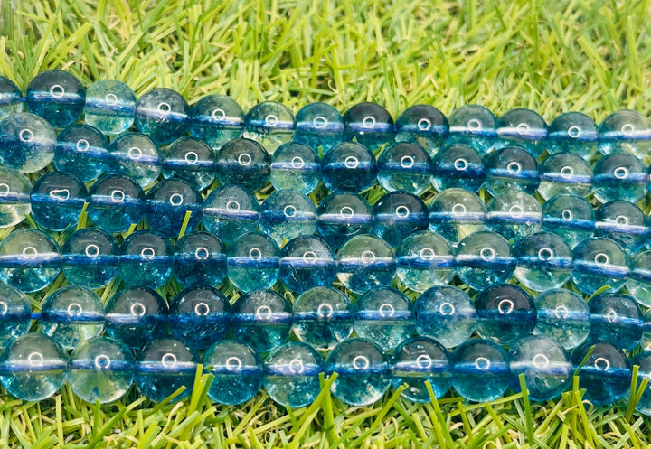 Perles naturelles en Cristal de Roche craquelé bleu en 8 mm - Les bijoux de Théa