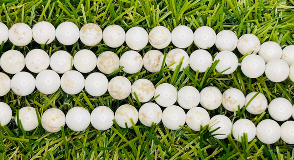 Perles naturelles en Magnésite en 6 mm - Les bijoux de Théa