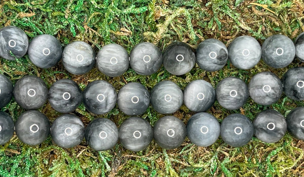 Perles naturelles en Oeil d’Aigle en 10 mm - Les bijoux de Théa