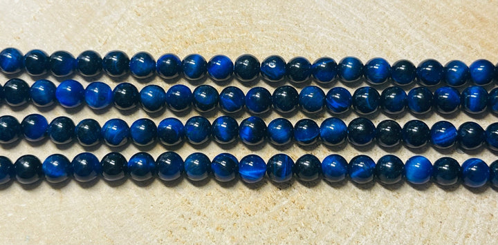 Perles naturelles en Oeil de Tigre bleu en 8 mm - Les bijoux de Théa