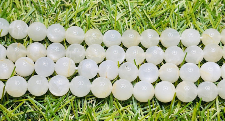 Perles naturelles en Pierre de Lune blanche crème en 6 mm - Les bijoux de Théa
