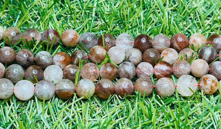 Perles naturelles en Pierre de Soleil multi en 8 mm - Les bijoux de Théa