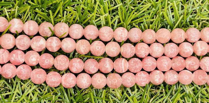 Perles naturelles en Rhodochrosite en 6 mm - Les bijoux de Théa