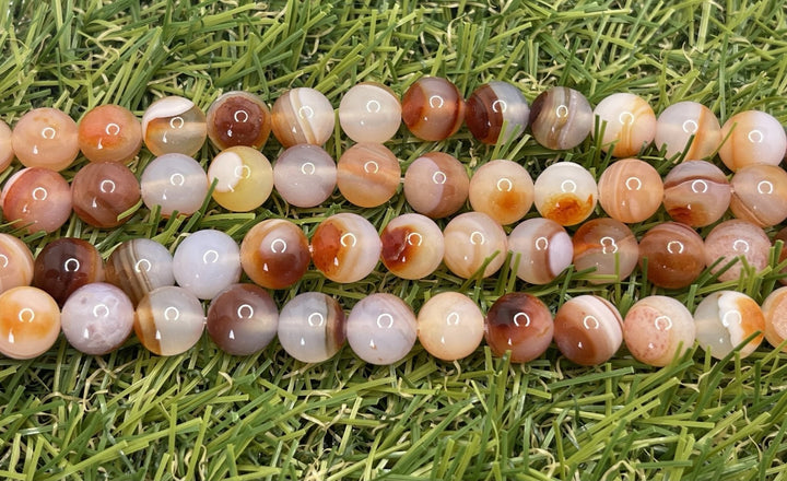 Perles naturelles en Sardonyx orange en 6 mm - Les bijoux de Théa