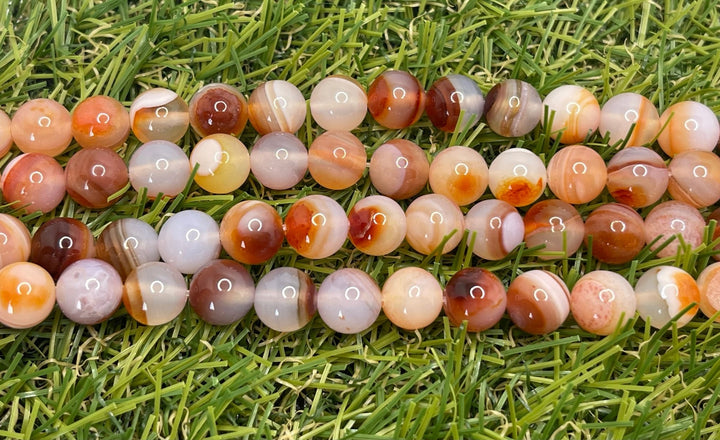 Perles naturelles en Sardonyx orange en 8 mm - Les bijoux de Théa