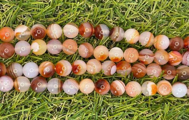 Perles naturelles en Sardonyx orange en 8 mm - Les bijoux de Théa