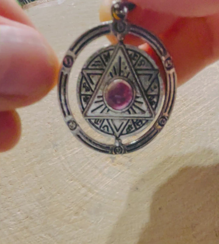 Pendentif Étoile argenté avec Amethyste qui tourne - les bijoux de Thea 