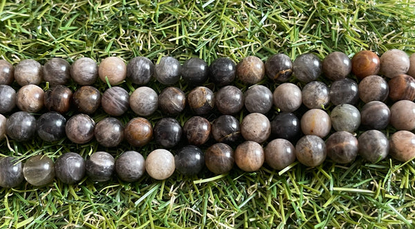 Perles naturelles en Pierre de Soleil noire pèche en 8 mm