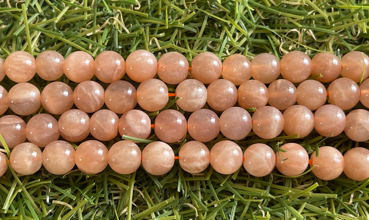 Perles naturelles en Pierre de Soleil en 6 mm - Les bijoux de Théa