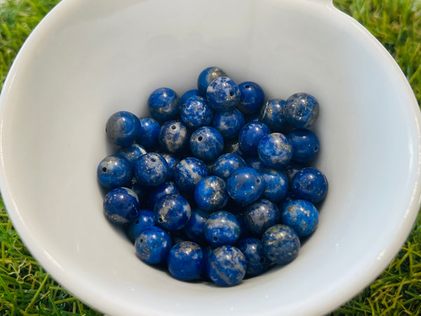 Perles naturelles en Lapis lazuli en 8 mm (lot de 10 perles) - Les bijoux de Théa